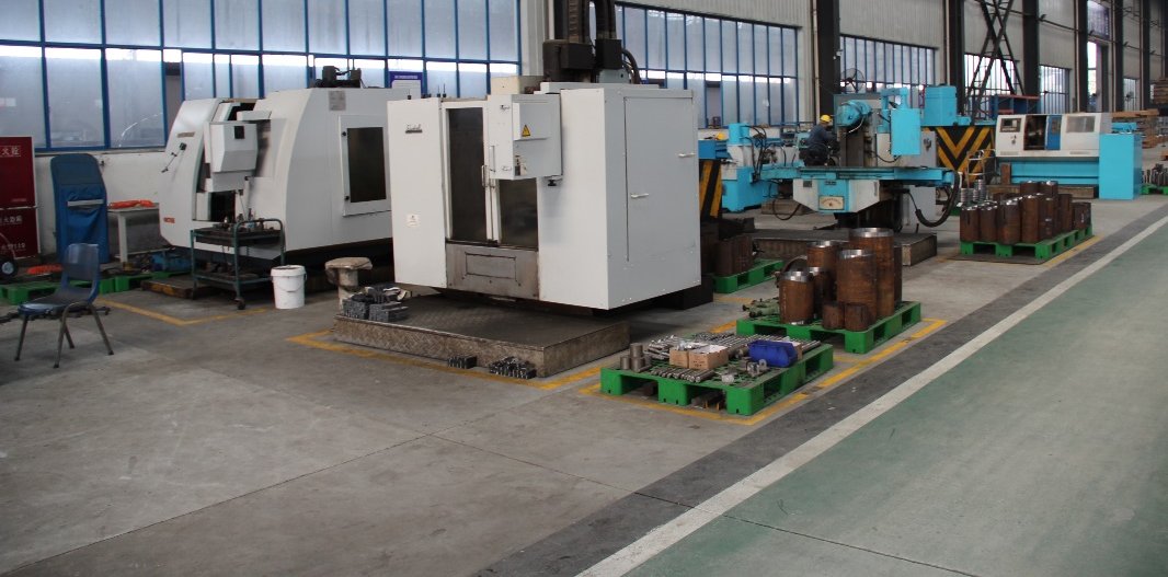 CNC machining centers producing pipe support components at the manufacturing base