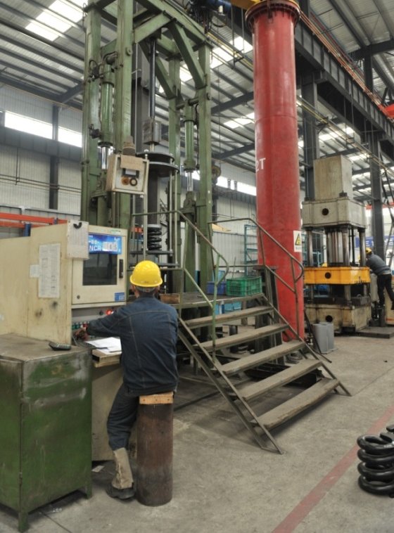 Spring hanger load testing and assembly area at the pipe support manufacturing base